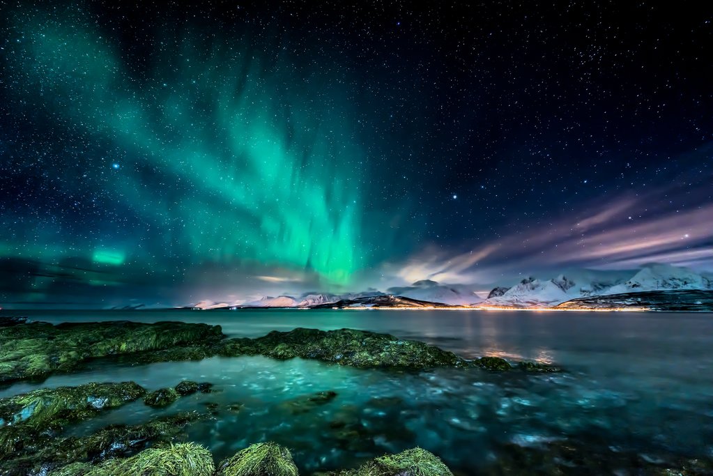 Northern Lights (Aurora Borealis) over a Nordic fjord